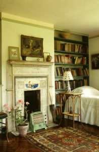 A view towards the fireplace in Virginia Woolfs bedroom at Monk's House, East Sussex
