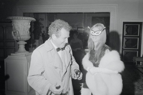 Norman Mailer and Guest In Costume